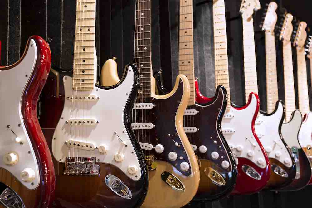 Electric guitars hanging on a wall