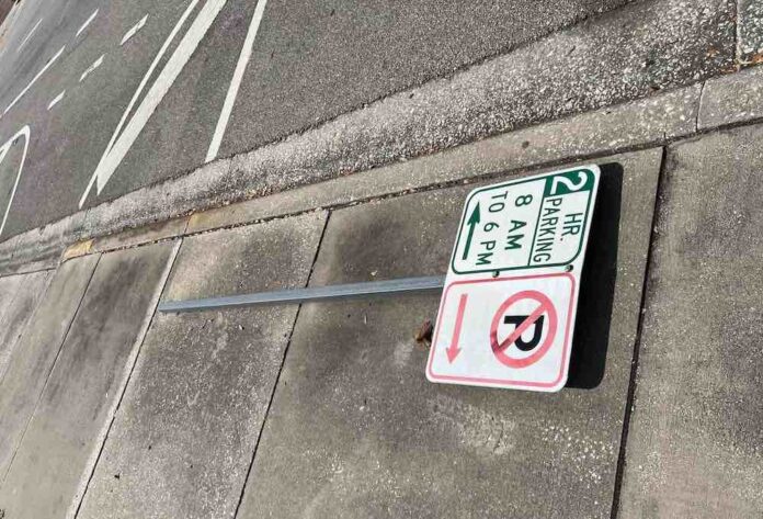 Broken 2 hour parking sign in downtown Orlando
