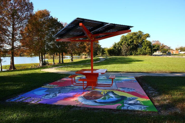 City unveils new solar-powered, picnic tables with Wi-Fi, charging abilities