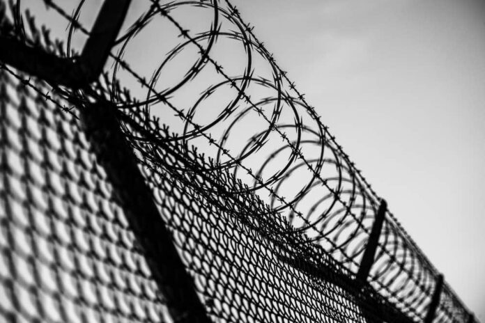 Prison barb wire fence