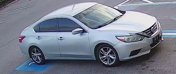 The suspects were seen driving in this silver Nissan Altima