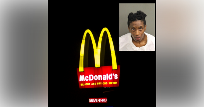 Shandricka Warren holds up McDonalds