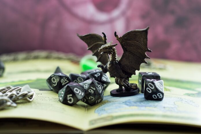 Dungeons and Dragons dice and dragon