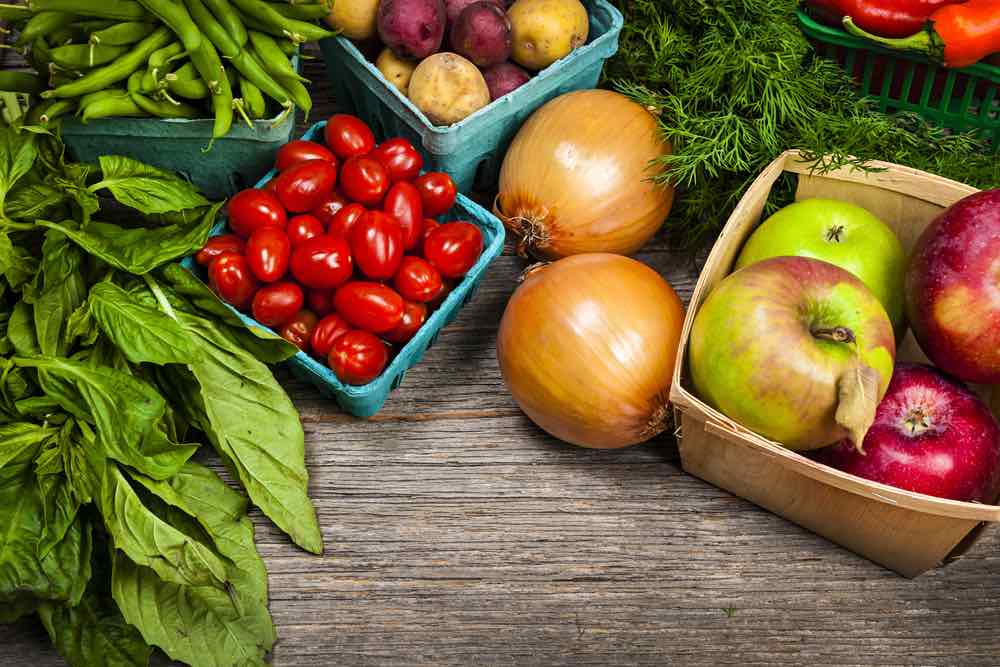 Fresh fruit and vegetables on wood table