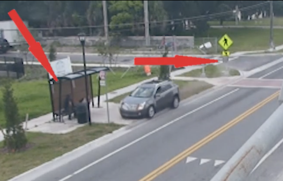 Roberts drives off in a gold Caddilac after firing shots at Orlando Police Officers on May 18