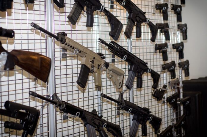 Gun rack with rifles pistols