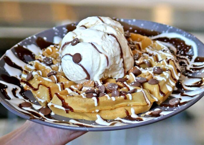 Waffle topped with homemade ice cream at White Rabbit Dessert Experience