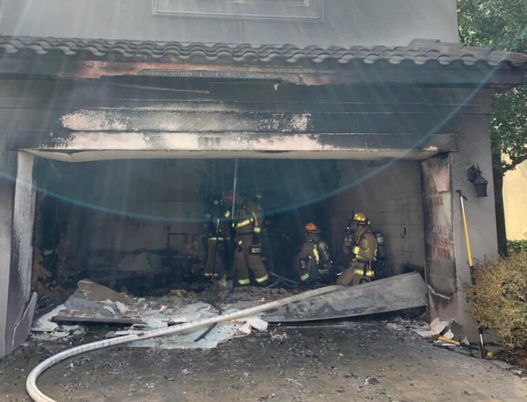 Firefighters extinguish Sanford garage fire less than seven minutes after receiving call