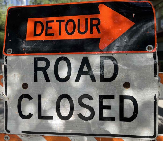 Road Closed Detour sign