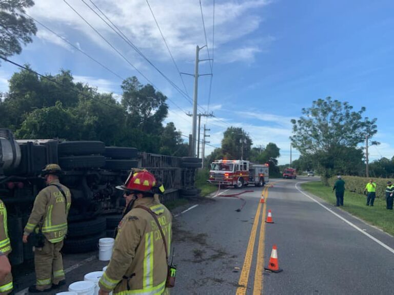 Seminole County firefighters respond to a flipped landfill truck in Geneva