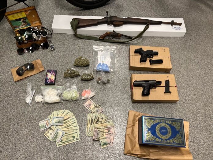 Stolen property, guns, MDMA, other drugs, thousands in cash seized during raid of Westmoreland Drive residence on July 28