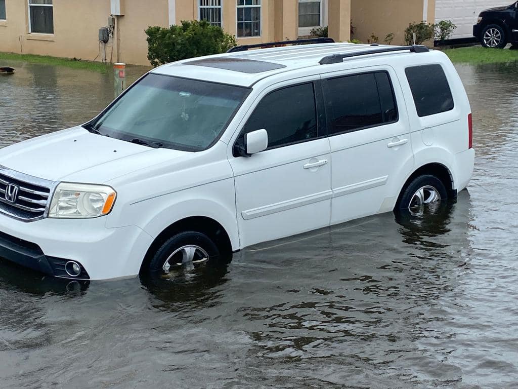 Car entrenched in water in Osceola County