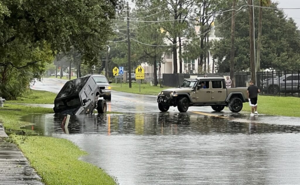Car submerged on Kissimmee roadway