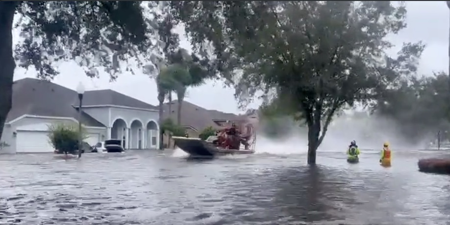 Orange County emergency personnel use airboats to rescue people