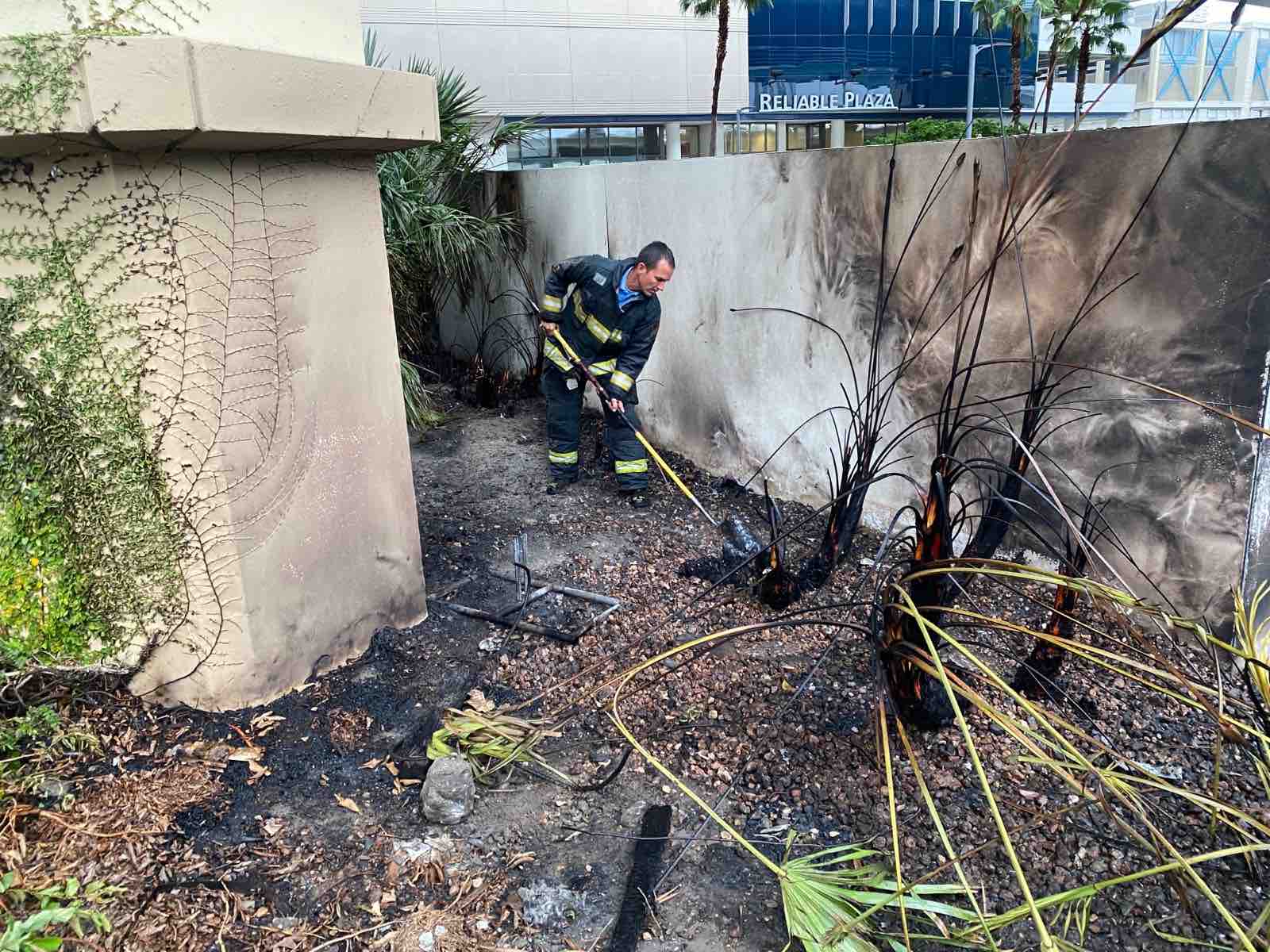 Orlando Fire Department firefighters extinguish dumpster fire started by lightning strike