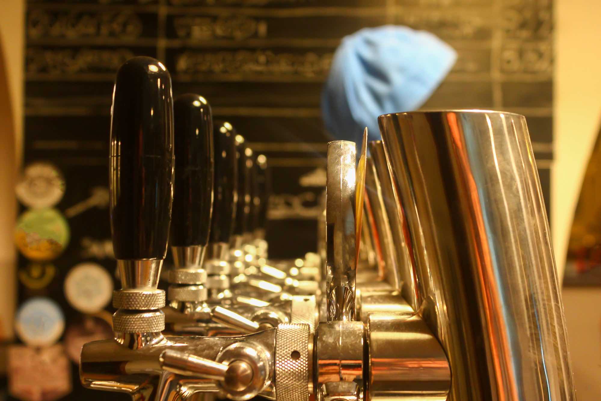 Beer taps at bar during bar crawl