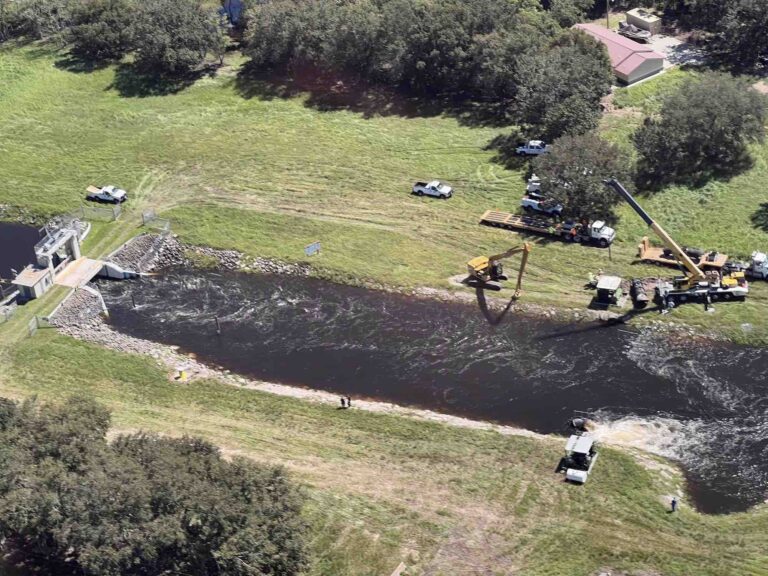 SFWMD Crews work at reducing water flow in Osceola chain of lakes
