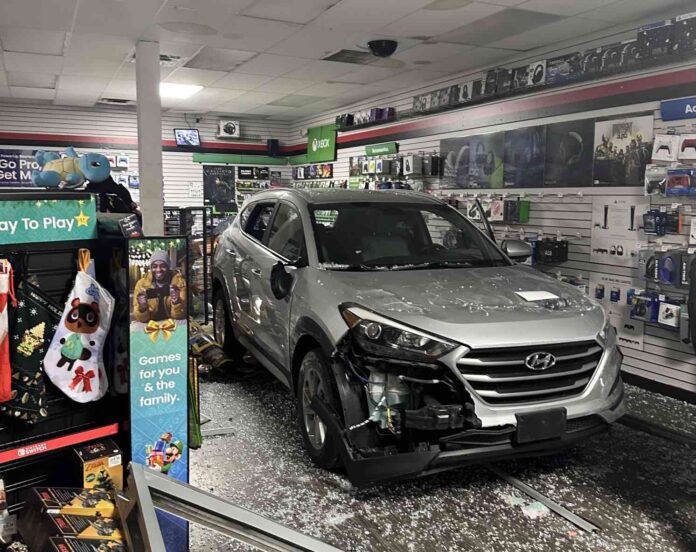 Vehicle crashed into Game Stop on Colonial Drive