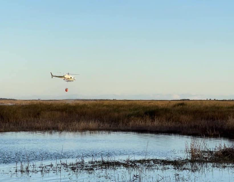 Alert 1 dropping water on fire in Oviedo on January 8
