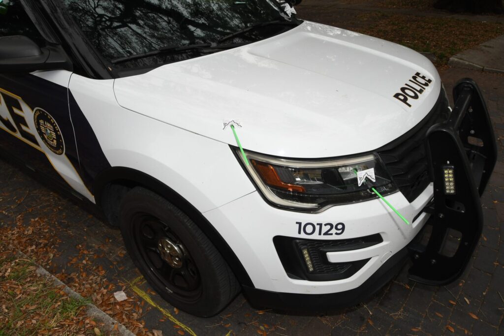 Bullet holes on Orlando Police Department patrol vehicle