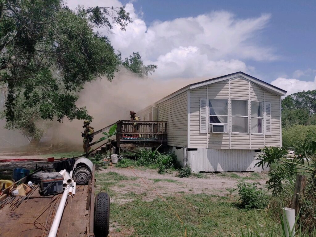Smoke billowing from single wide mobile home in Geneva on April 27