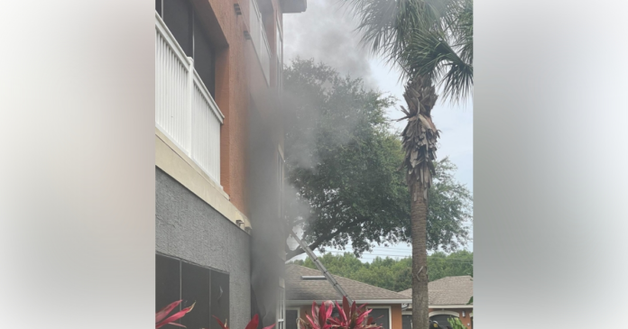 Smoke billowing from apartment during fire on May 29