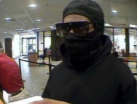Masked suspect wanted in armed robbery at Truist Bank on May 17