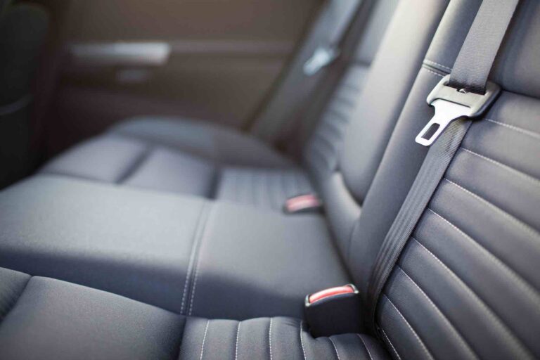 Seat belt in back seat of car interior