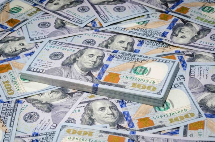 One hundred dollars bills U.S. money background