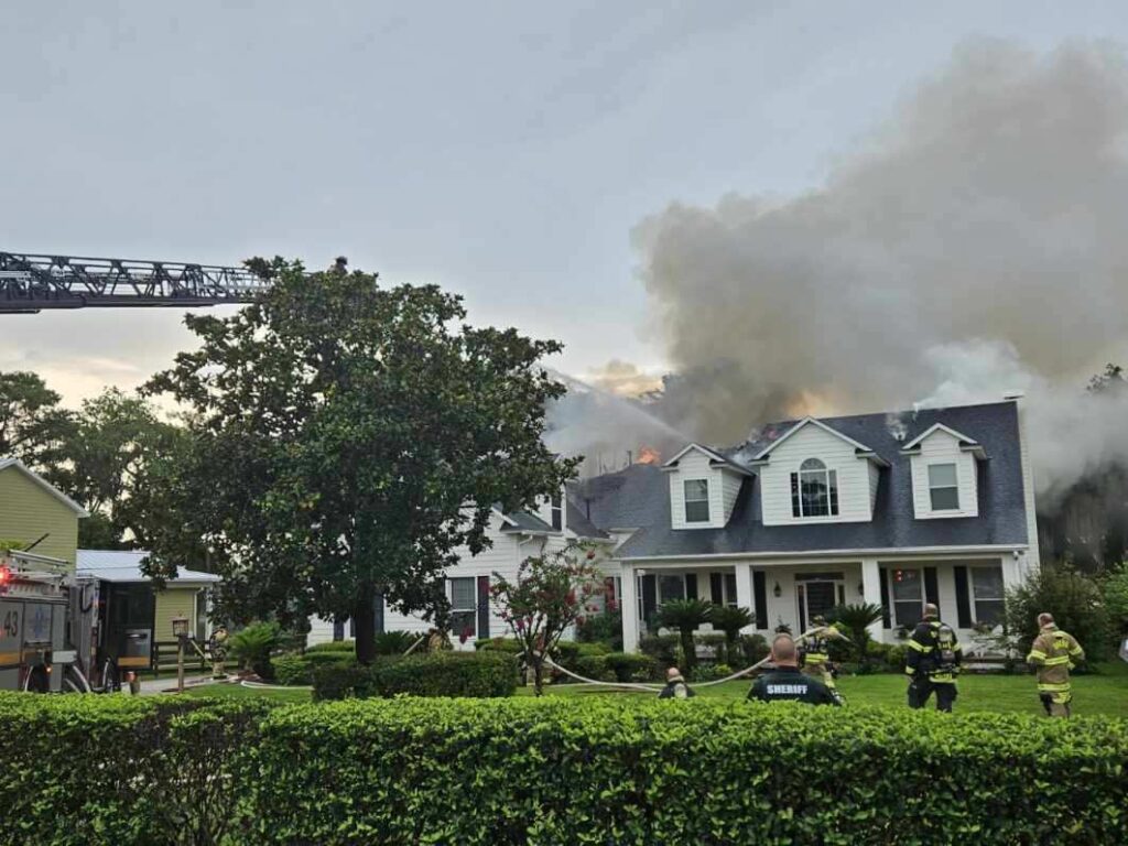 Smoke billows from Chuluota home during fire on July 17