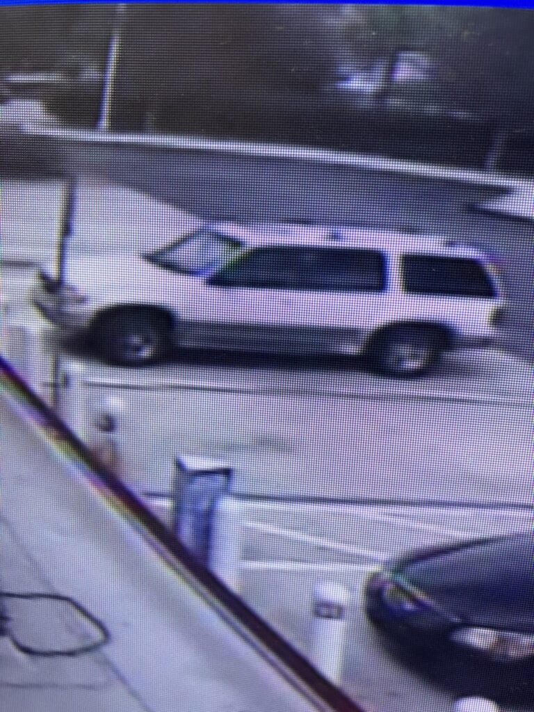 White Ford Explorer that couple fled in