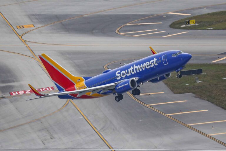 Southwest Airlines Boeing 737 taking off from airport tarmac