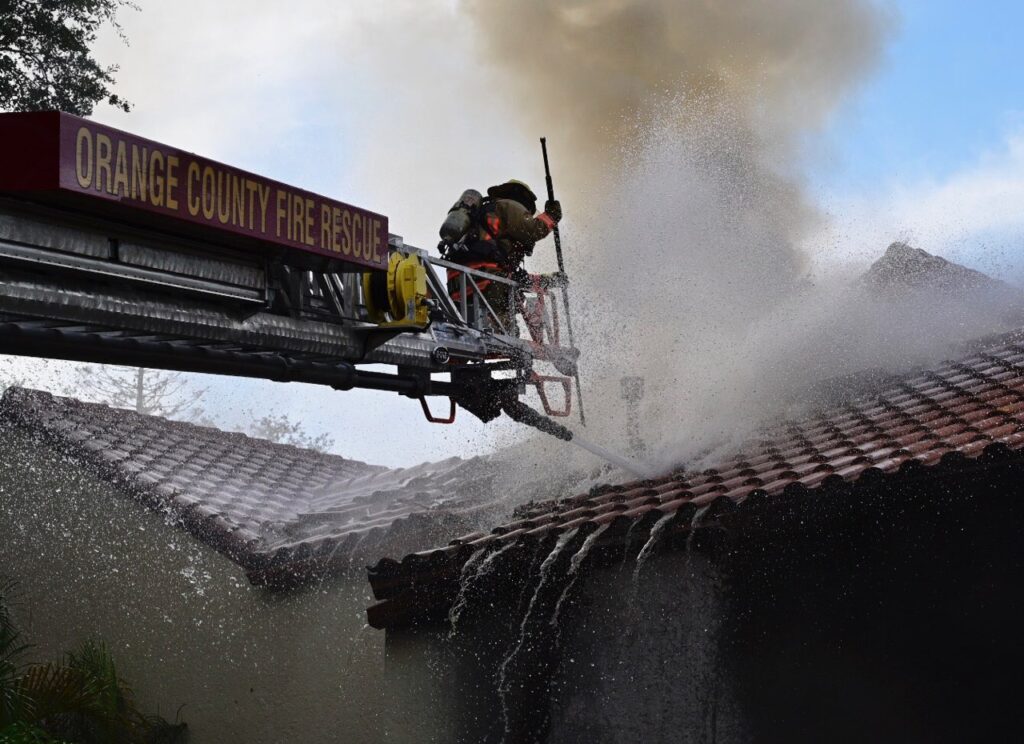 Firefighters tackle fire at garage in Windermere