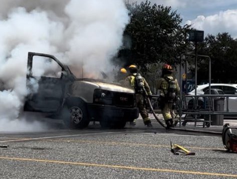 Smoke billows from cargo van that caught fire at Oviedo Walmart