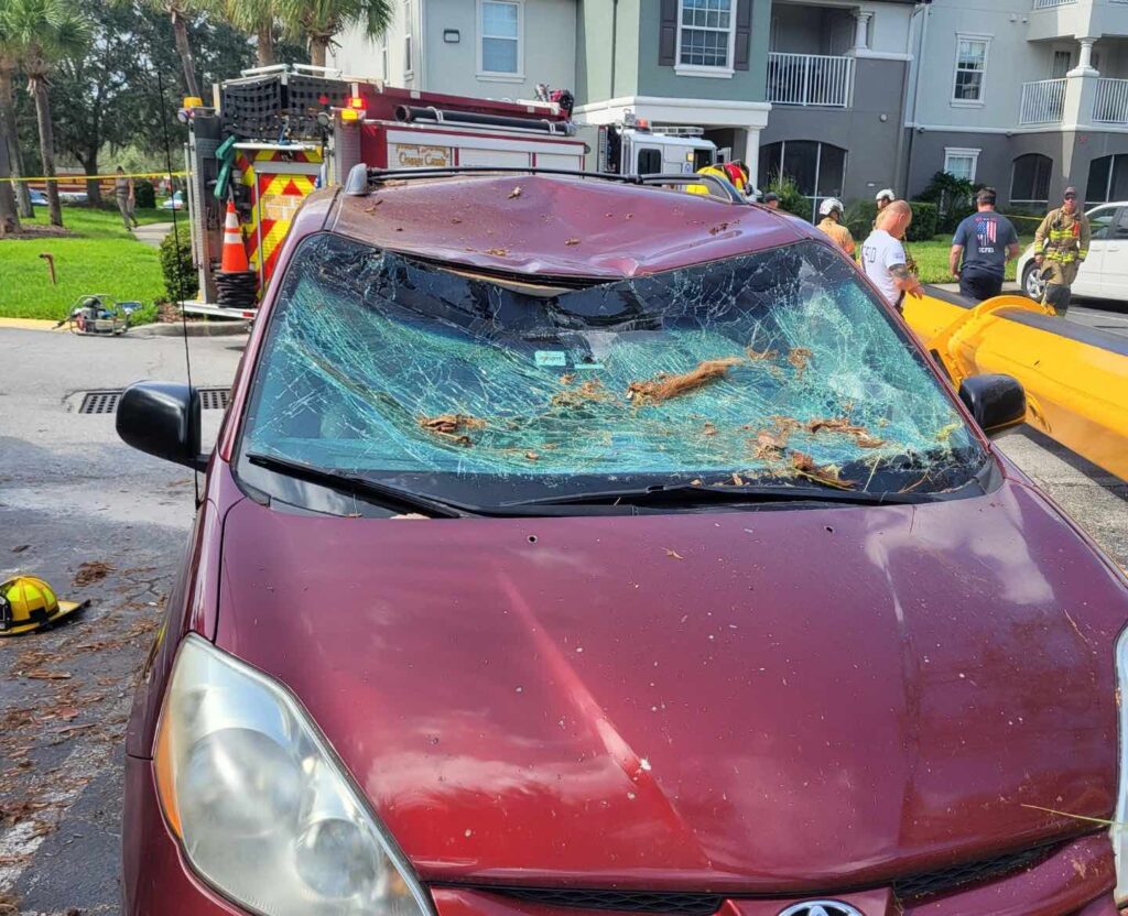 Car smashed by overturned crane on October 3