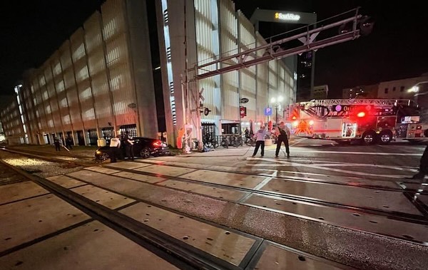 Firefighters help car stuck on tracks in downtown Orlando on Oct. 7 2023