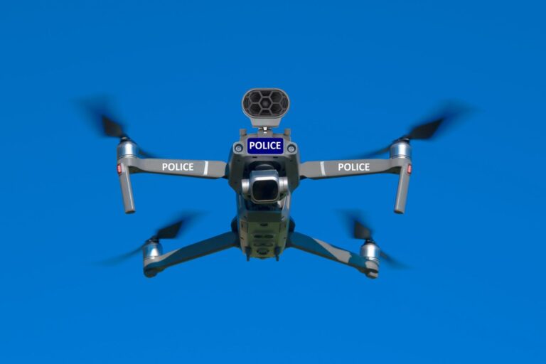 Police unmanned aircraft system, Drone flying, blue sky background