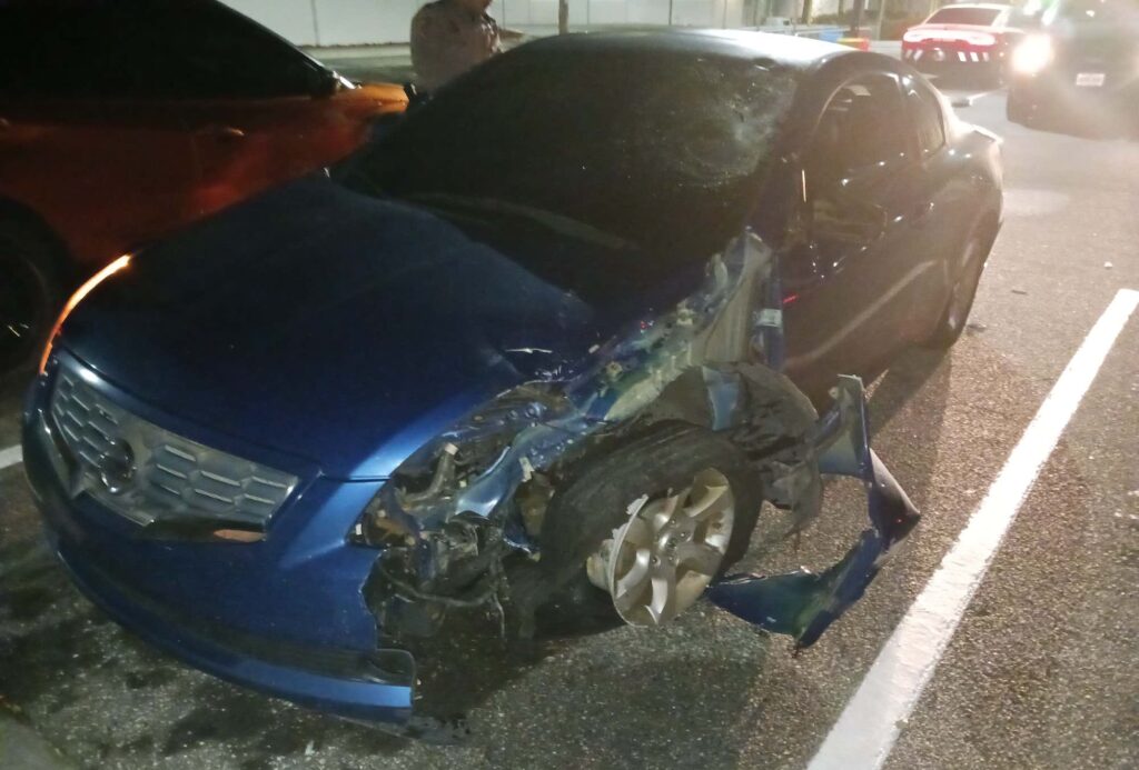 Nissan Altima that allegedly struck a moped on Nov. 6