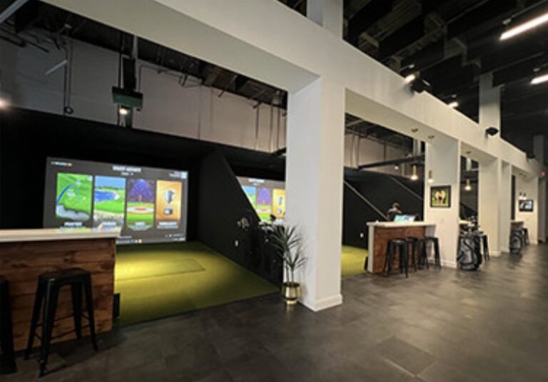 Simulator bays at The Greens Indoor Golf & Bar