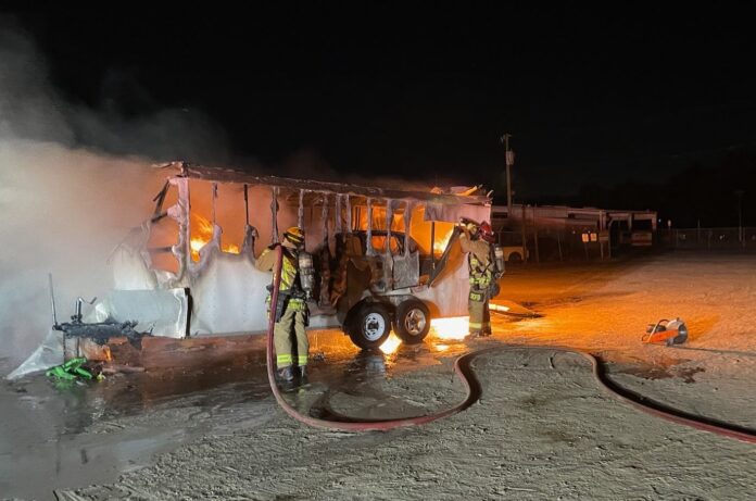 Vehicle trailer on fire at auto auction in Sanford on February 6