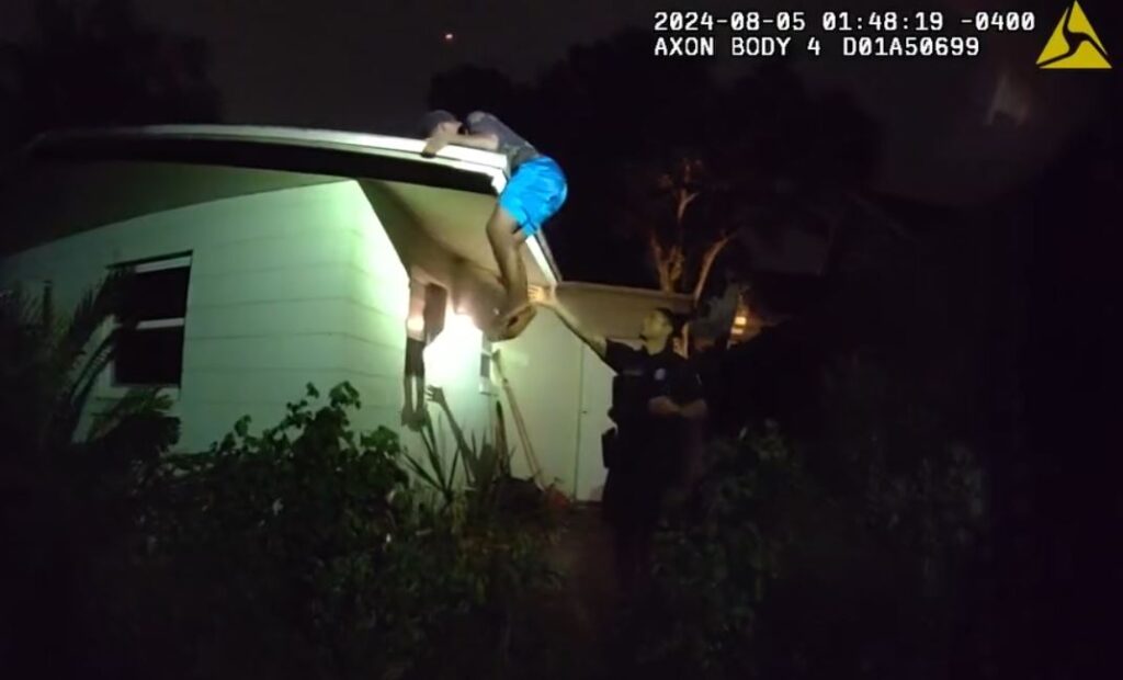 According to Orlando police, one of the juvenile suspects was later found hiding on top of a nearby roof. (Photo: Orlando Police Department)