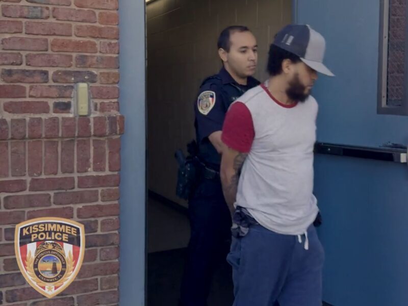 A KPD officer arresting 44-year-old Carlos Manuel Tejada in connection with a fatal celebratory gunfire incident that occurred on January 1, 2025. (Photo: Kissimmee Police Department)