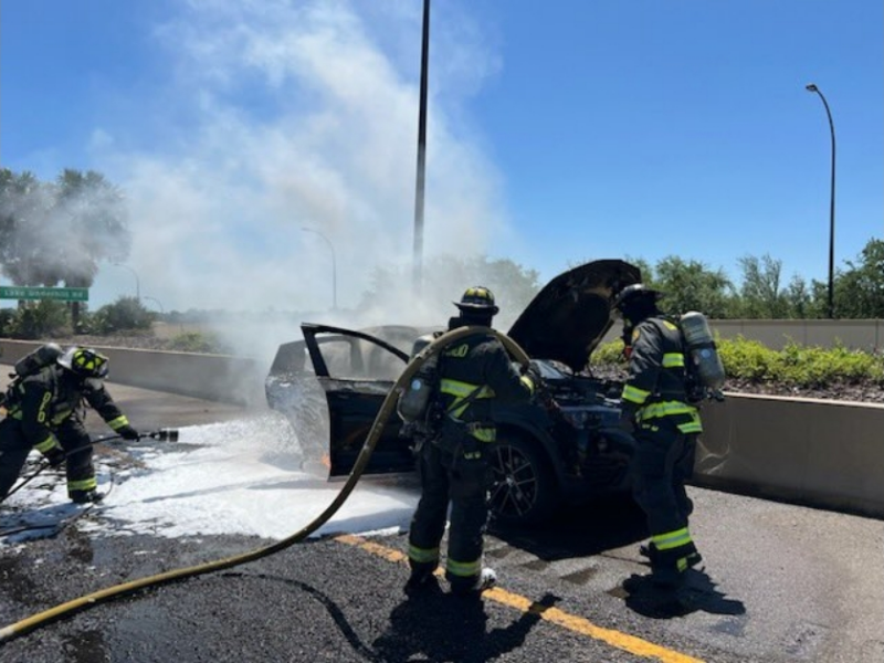 Orlando firefighters extinguishing a car fire on State Road 408 on April 12, 2025. (Photo: Orlando Fire Department)