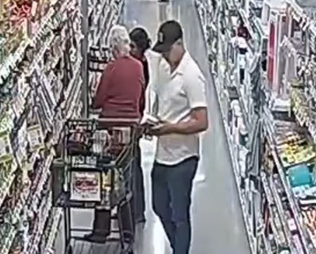 Wallet theft from purse at Publix in Clermont on April 9, 2025 man holding wallet he stole from victim s purse