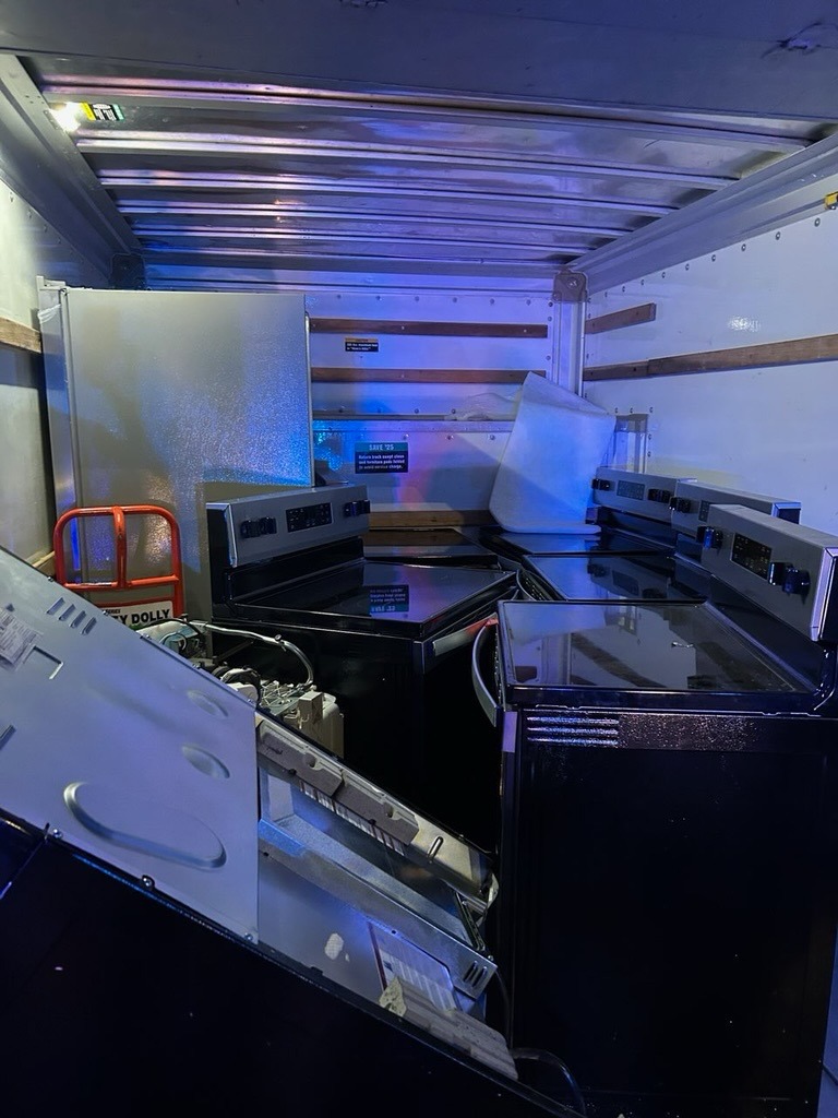 Gabriel Sarmiento and John Michael Torres Colon interior of moving truck 3