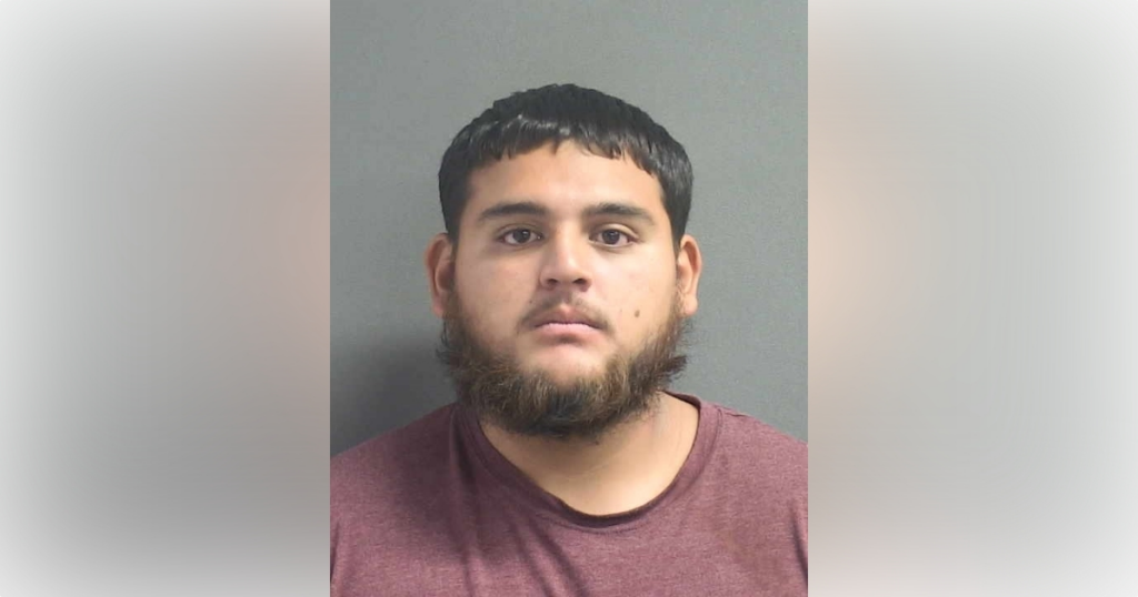 Axel Jeremiah Gomez (Volusia County Jail booking photo)