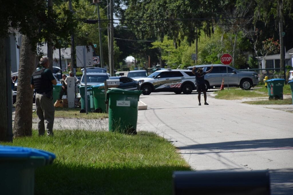 Bernard Millsap, 26, surrendering to police on June 15, 2026, hours after he allegedly broke into his ex-girlfriend's home and fired a gun. (Photo: Holly Hill Police Department)