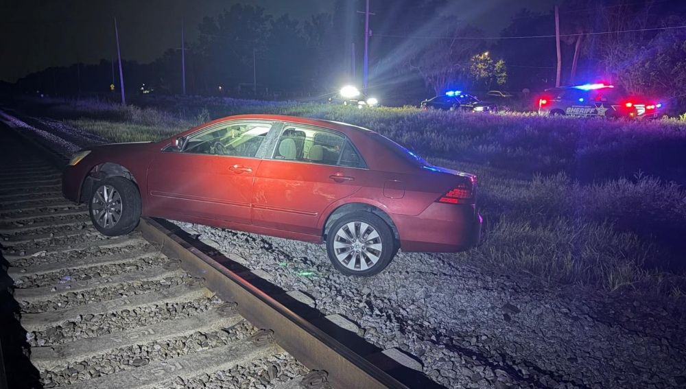 According to FHP, the single-vehicle crash caused railroad traffic in the area to be temporarily halted on Saturday morning. (Photo: Florida Highway Patrol)