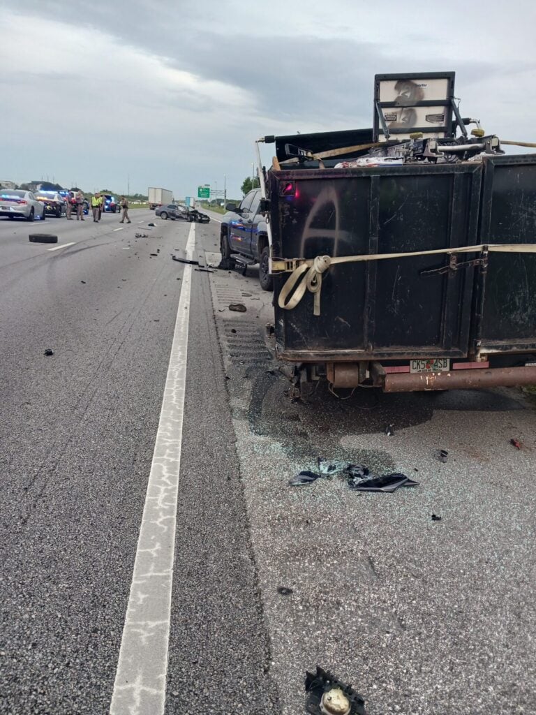 The Toyota Camry crashed into this trailer before striking the Apopka man as he stood outside of his pickup truck. (Photo: Florida Department of Highway Safety and Motor Vehicles)