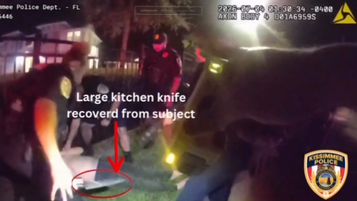 Nicholas Efrain Rosario - A KPD officer holding a large kitchen knife that was allegedly recovered from the suspect